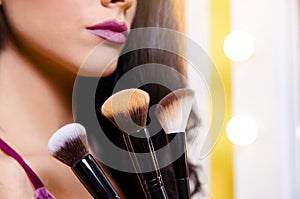 Makeup up / beautification concept , unrecognizable woman photo