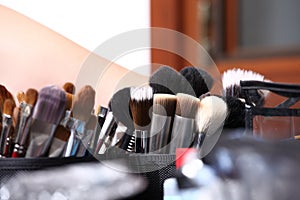 Makeup various colored brushes, closeup