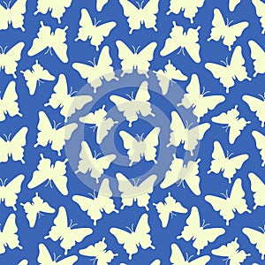 Makhaon butterflies silhouettes pattern. Seamless background with beautiful flying insects. Blue and yellow print. Vector repeat