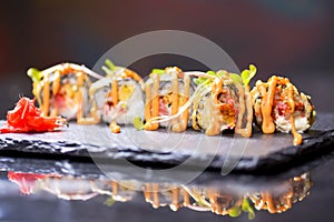 Maki Futomaki Sushi Rolls with eel, egg, unagi sauce. Sushi menu. Japanese food.