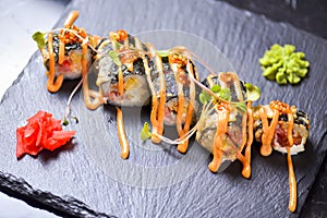 Maki Futomaki Sushi Rolls with eel, egg, unagi sauce. Sushi menu. Japanese food.