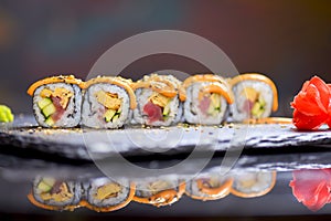 Maki Futomaki Sushi Rolls with eel, egg, unagi sauce. Sushi menu. Japanese food.