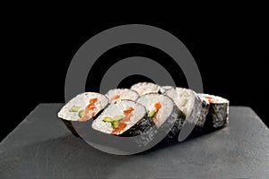 Maki sushi with cucumber and salmon.
