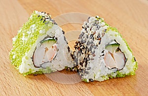 Maki Sushi Roll with Shrimps and Green Tobiko