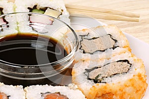 Maki sushi with soy sauce