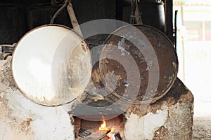 Making arak in barrels