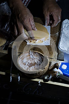 Making of Banh Dua coconut biscuit.