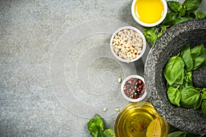 Making basil pesto, border background with ingredients