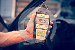 Making car diagnostics using obd device photo