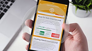 Making Charity Donation To International NGO Using Smartphone App