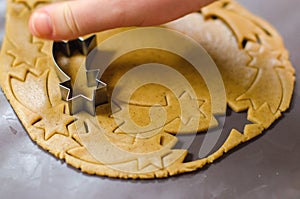 Making Christmas cookies. Star shape