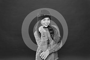 Making christmas wish. Stay warm. Little girl winter fashion accessory. Small child long hair wear hat burgundy