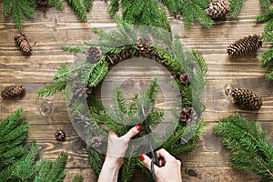 Making Christmas wreath using fresh and all natural materials.