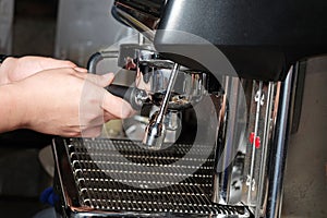 Making coffee with espresso machine
