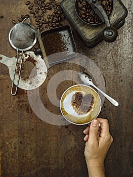 Making coffee on an old wooden table