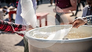 making cotton candy at a festival