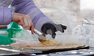 Making crepes, French pancakes at farmers market