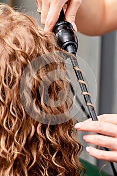 Making curls by curling iron