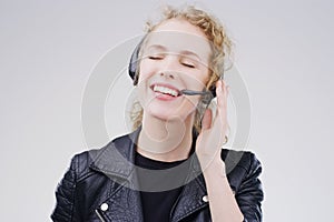 Making a customer happy is the highlight of my day. Studio shot of an attractive young female customer service