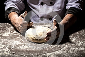 Making dough by male hands at bakery. the concept of nature, Italy, food, diet and bio, home baking