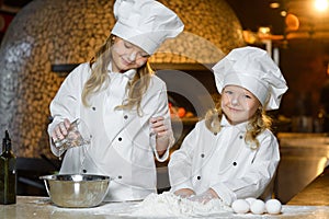 Making the dough for pizza is fun - little chefs