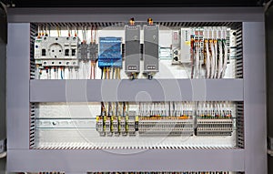 Making an electricity panel board - the inside of the panel - slots and wires