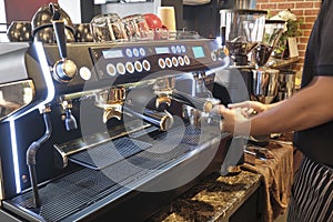 Making espresso in a cafe shop