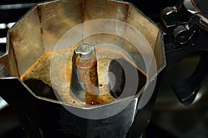 Making espresso in an Italian coffee maker photo