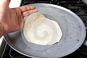 Making flour tortillas