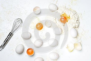 Making fresh pasta or dough.Eggs, flour on the white background