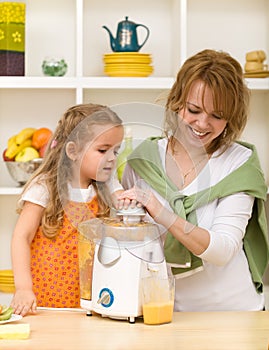 Making fruit juice with mom