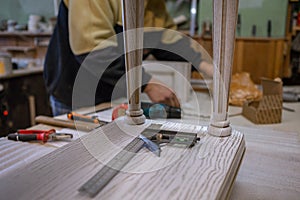 Making furniture from wood. Work carpenter. Carpentry tools