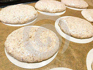 Making german almond macarons macaroon raw before baking oblate rice paper icing sheet