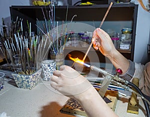 Making a glass bead on a gas burner
