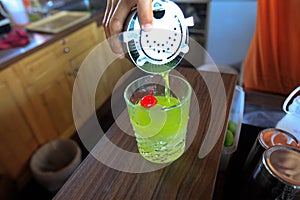 Making a Glass of green drink, Cocktails, cold drinks make you feel refreshed