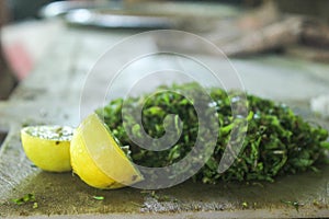 Making of Gotukola Sambol / Gotukola salad with onion and lime