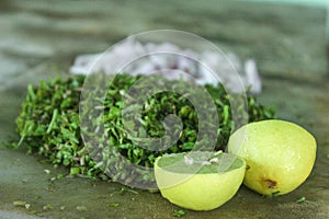 Making of Gotukola Sambol / Gotukola salad with onion and lime