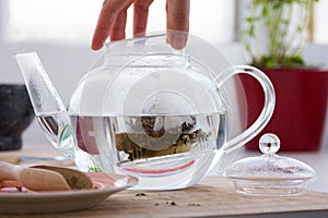 Making of Green tea with ginseng and sage set photo