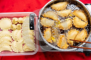 making Guangdong-style crispy pastry dumpling for Chinese New Year photo