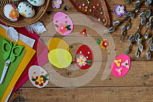 Making of handmade easter eggs from felt with your own hands. Children DIY concept. Making Easter decoration or greeting card.