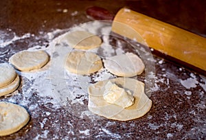 Making home made cheese pirogi