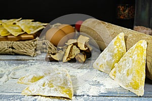 Making home made ravioli with porcini mushrooms