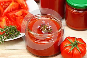 Making homemade tomato ketchup with oregano spice