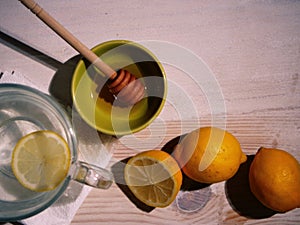 Making hot Lemon and honey for natural treatment of cold and flu