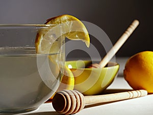 Making hot Lemon and honey for natural treatment of cold and flu