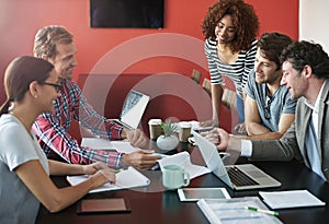 Making ideas a reality. a group of colleagues having a meeting in a boardroom.