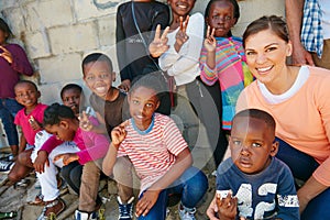 Making an impact on the lives of these children. Portrait of kids at a community outreach event.