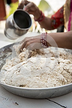 Making indian naan bread dough photo