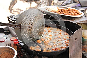 Making of Indian snack food Padoda