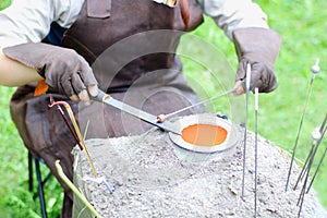 Making jewelry from metal.